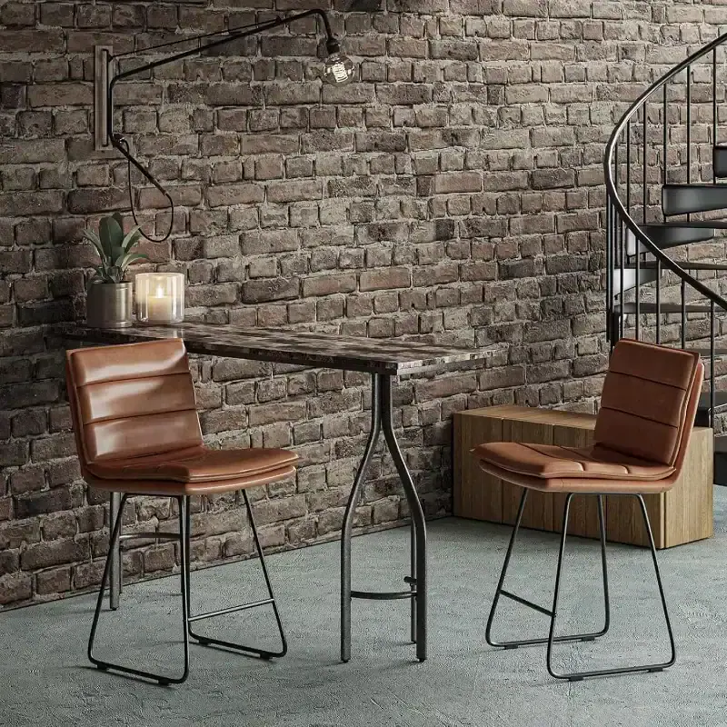 Elegant furniture setup for an optometry store, featuring stylish chairs and a brick wall background, ideal for eye care clinics seeking contemporary visual aesthetic.