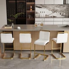 Elegant shopping environment at Monalisa Store featuring stylish bar stools and luxurious decor for a comfortable customer experience.