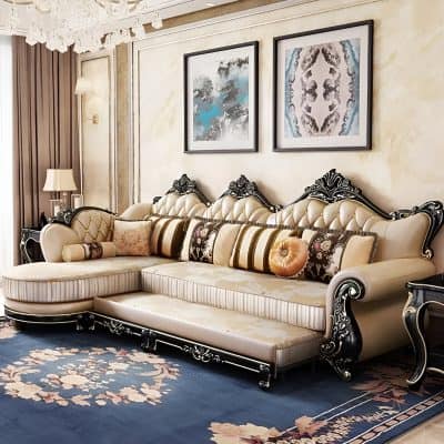 Sophisticated living room sofa with intricate woodwork, plush cushions, and stylish decor perfect for home aesthetics.