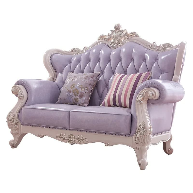 Luxurious lavender Victorian sofa with tufted design, intricate carved wood accents, perfect for elegant living rooms or boutique interiors.