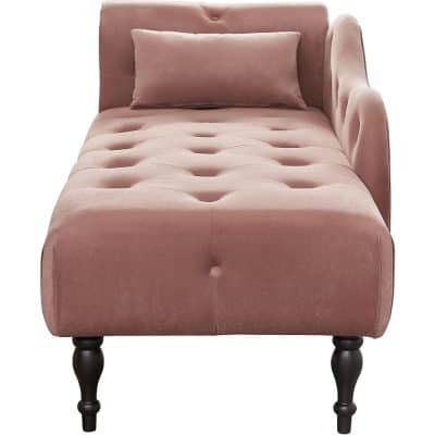Elegant pink velvet sofa with button-tufted design and wooden legs, perfect for modern living rooms and cozy spaces.