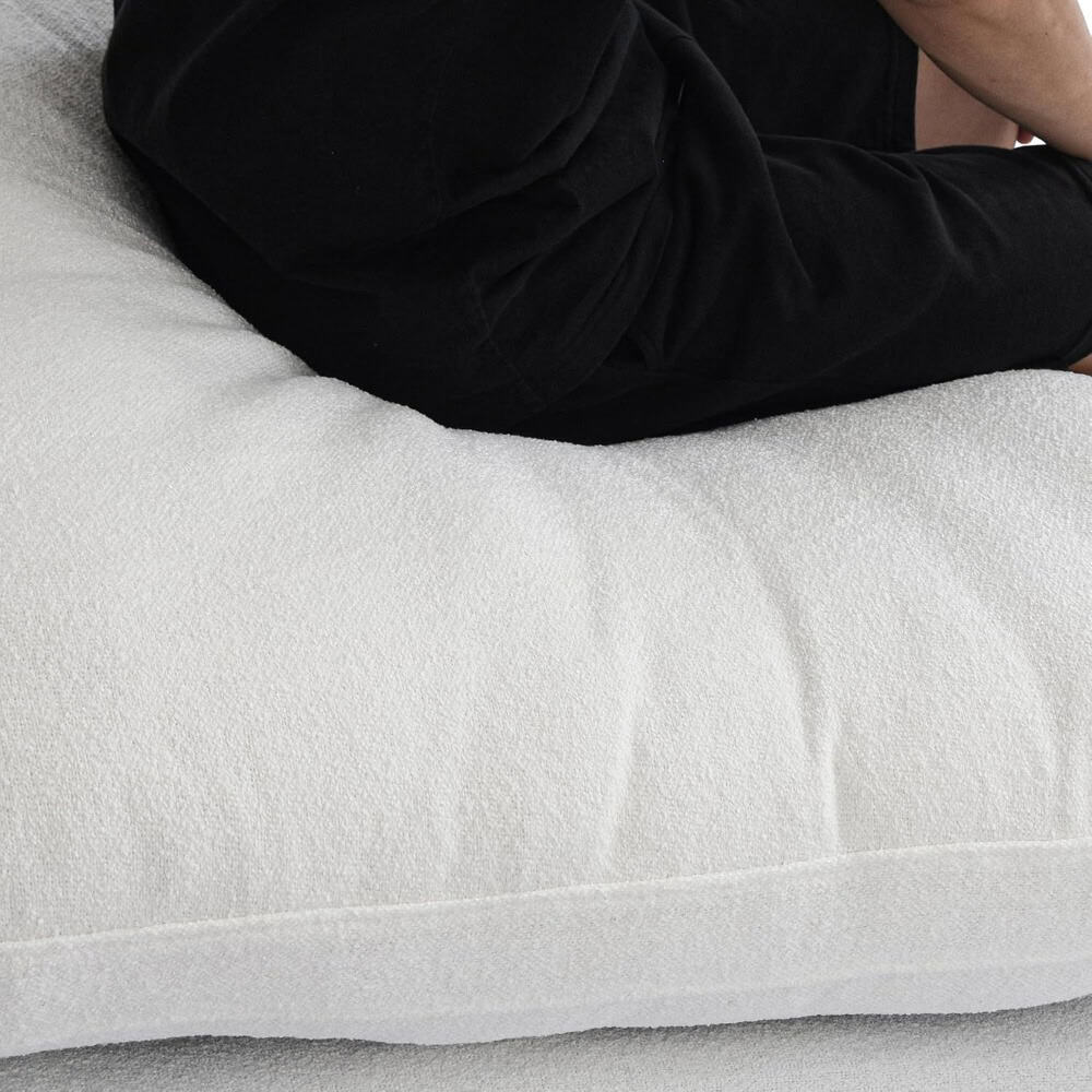 High-quality textured fabric sofa bed, perfect for contemporary living rooms and guest accommodations, offering comfort and style.