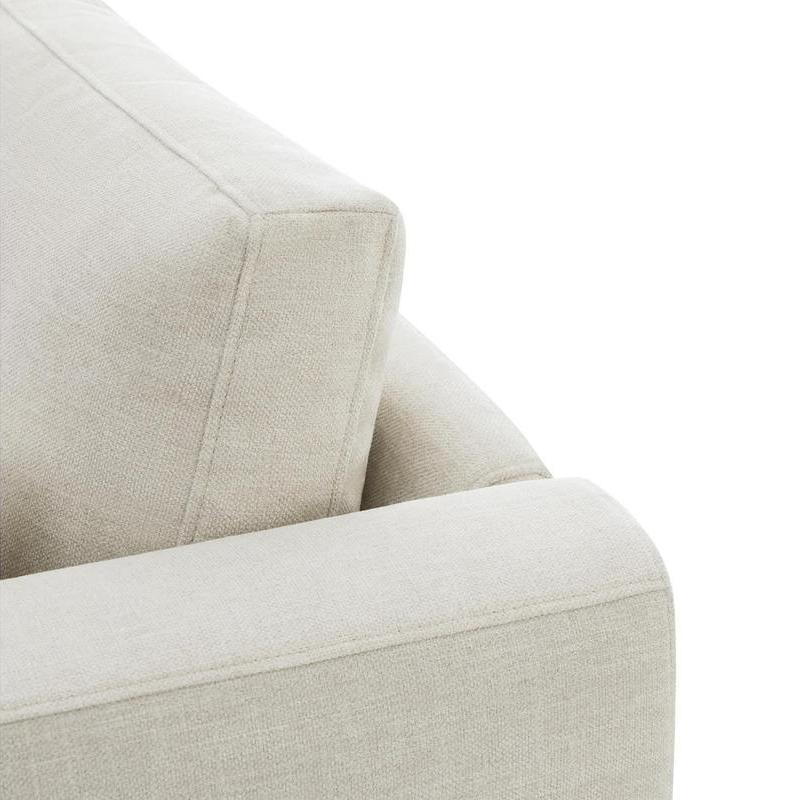 Modern beige sofa for comfortable living room décor.