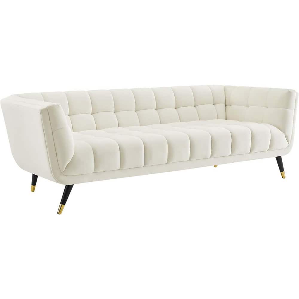 Elegant white upholstered sofa, stylish design, comfortable seating, perfect for living rooms, home decor, and furniture shopping.