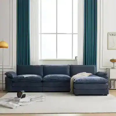Luxurious navy blue sofa with plush cushions, ideal for stylish living rooms and op wellness spaces. Perfect for enhancing comfort and aesthetic appeal with quality furniture.