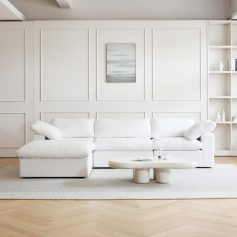 Elegant white sofa in a contemporary living space, perfect for modern home decor, comfort, and stylish design. Ideal for living room setups seeking a clean, sophisticated aesthetic.