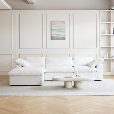 Elegant white sofa in a contemporary living space, perfect for modern home decor, comfort, and stylish design. Ideal for living room setups seeking a clean, sophisticated aesthetic.