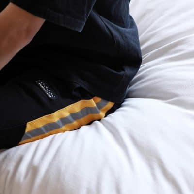 Close-up image of a man's casual outfit, focusing on soft clothing details, perfect for modern men's fashion and everyday comfort.