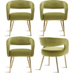 Luxurious green velvet chairs with sleek gold legs, ideal for contemporary home or office decor. These stylish accent chairs offer comfort and elegance, making them perfect for various interior settings.