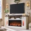 Stylish electric fireplace with TV setup and storage cabinet in a cozy living room setting. Perfect for modern homes needing elegant decor and functional furniture.