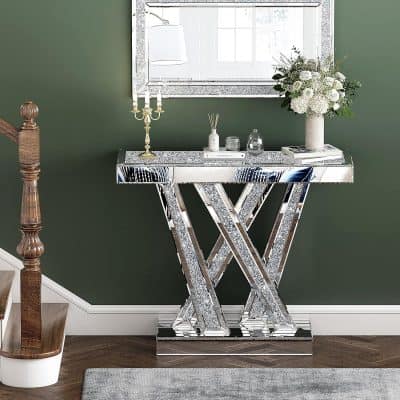 Luxurious silver mirrored console table with geometric design, perfect for modern home decor and entryways.