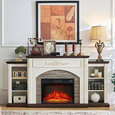 A beautifully decorated living room fireplace with elegant ornaments, candles, framed artwork, and a vintage lamp, creating a warm and inviting atmosphere for home comfort and style.