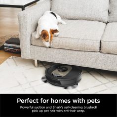 Robot vacuum cleaner cleaning pet hair under sofa, modern home, automatic floor cleaning, smart clean device for pet owners, Shark self-cleaning brushroll technology.