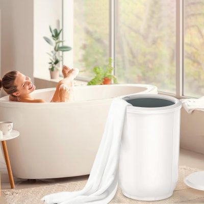 Luxurious white soaking bathtub with modern design, perfect for relaxation at Monalisa Store, showcasing high-quality wellness and self-care products for a soothing home spa experience.