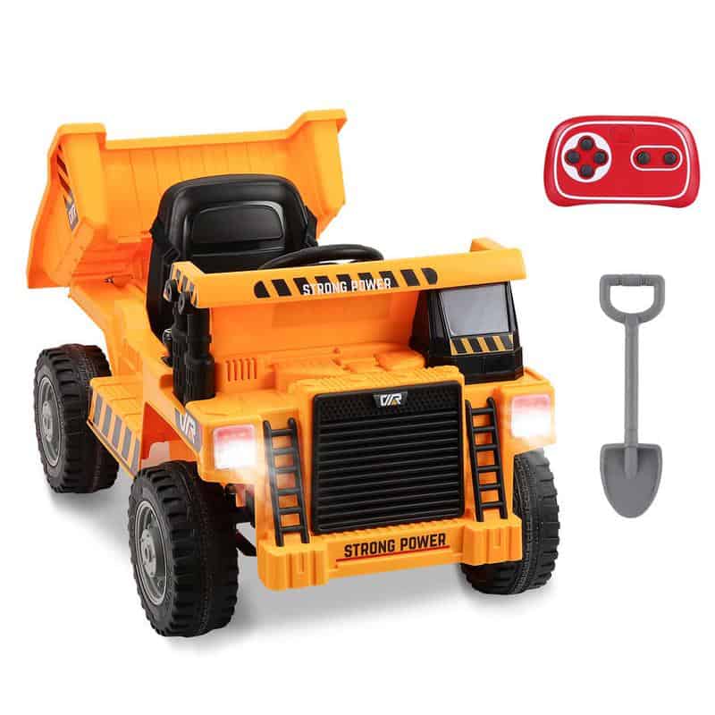 Battery-powered construction toy truck with shovel, remote control, and accessories, perfect for children interested in building and construction play.