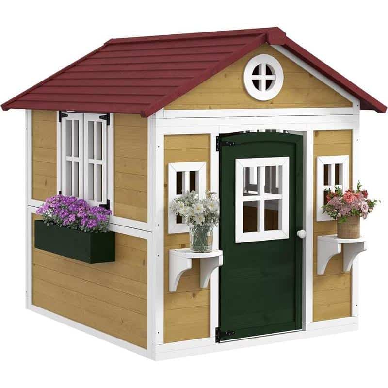 Garden playhouse with window boxes, green door, and flower planters, ideal for children's outdoor play and garden decor.