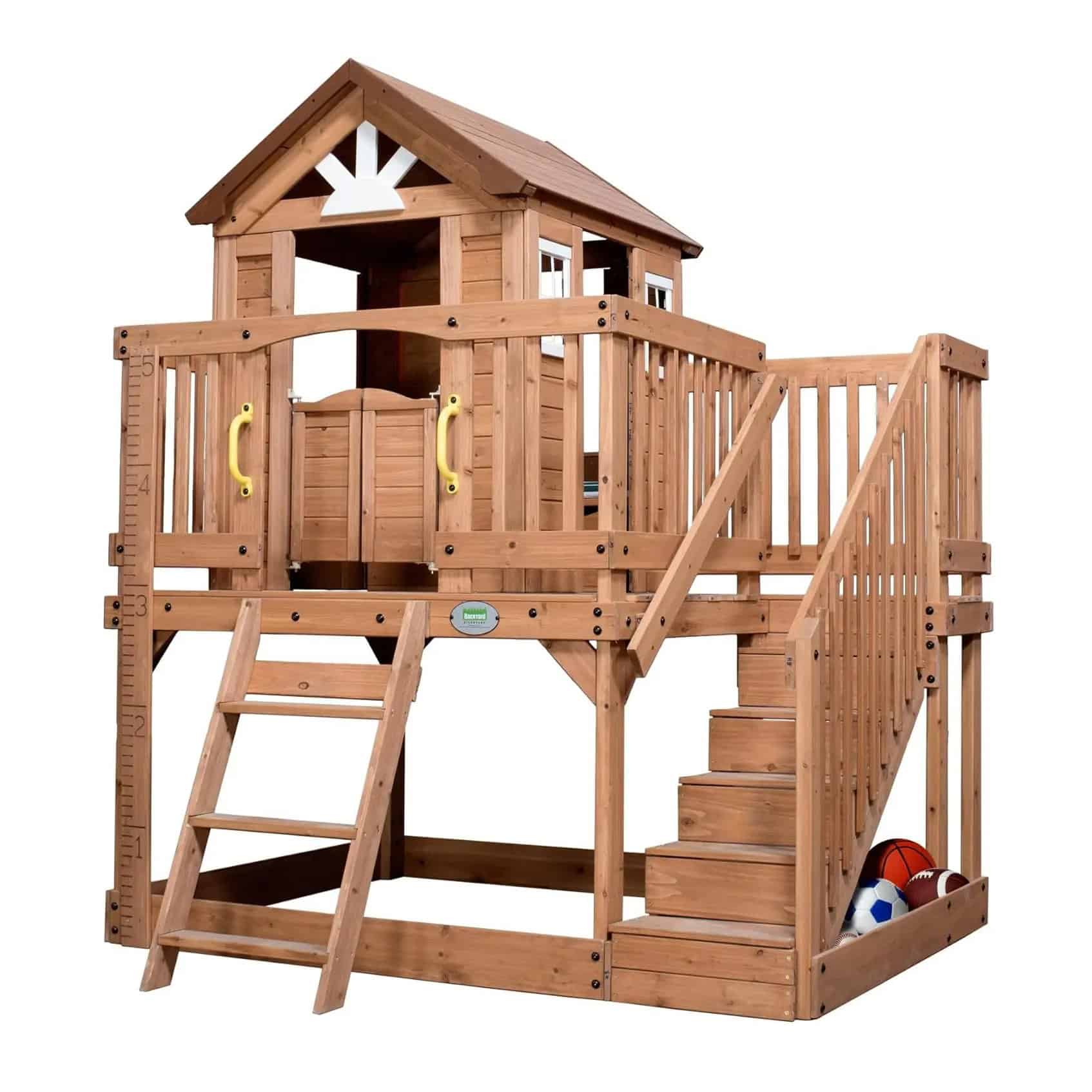 Natural wood outdoor playhouse with climbing stairs, slide, and sports balls storage, ideal for kids' backyard entertainment and creativity.