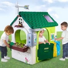 Colorful children's eco-friendly playhouse with solar panels, water-saving features, and garden accessories for outdoor fun and learning; perfect for eco-conscious families.