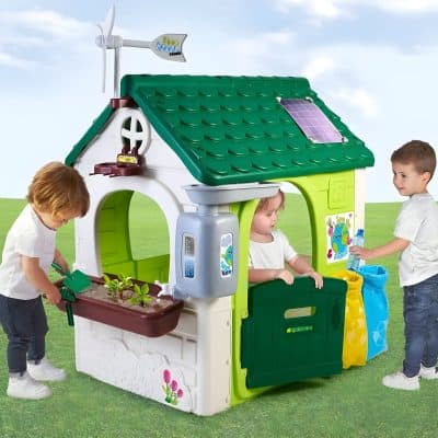 Colorful children's eco-friendly playhouse with solar panels, water-saving features, and garden accessories for outdoor fun and learning; perfect for eco-conscious families.