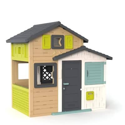 Colorful children's playhouse with multiple rooms and windows, designed for outdoor fun and imaginative play. Features a small door, shutters, and decorative details in tan, white, green, and blue.