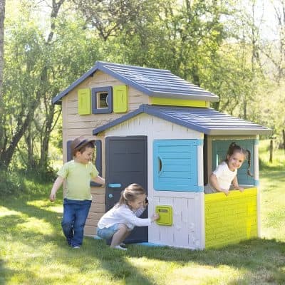 Colorful children's playhouse for outdoor fun, featuring a detailed design and vibrant blue, yellow, and gray accents, perfect for backyard entertainment and imaginative play.