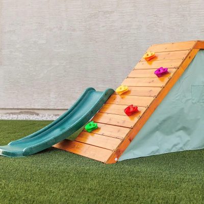 Slide with colorful climbing holds on wooden ramp for children’s outdoor play, ideal for kids' fitness and entertainment, sturdy design for safe fun, Monalisa Store outdoor playground equipment.