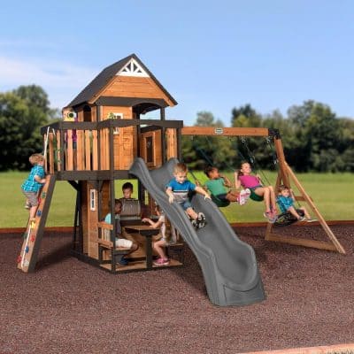 Colorful wooden playground set with slides, swings, and climbing wall for kids at Monalisa Store outdoor play area. Perfect for children's entertainment and physical activity.