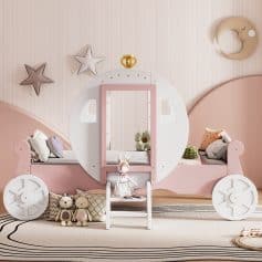 Whimsical pink and white children's bedroom with a carriage-shaped bed, plush toys, and soft decor, perfect for kids’ sleepovers or playrooms with dreamy, playful interior design.