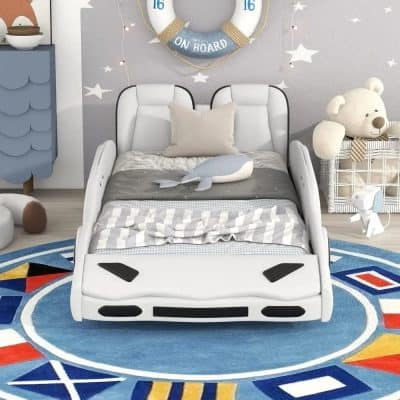 Whimsical race car toddler bed in a modern children's bedroom with soft toys and nautical decor, perfect for kids' sleep space. Ideal for a themed kids' bedroom, combining fun and comfort in Subaru-inspired design.