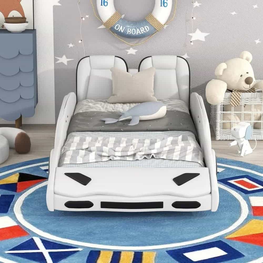 Whimsical race car toddler bed in a modern children's bedroom with soft toys and nautical decor, perfect for kids' sleep space. Ideal for a themed kids' bedroom, combining fun and comfort in Subaru-inspired design.