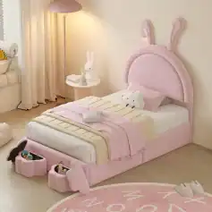 Soft pink bunny-themed kids' bed with plush headboard and cozy bedding, perfect for children's bedrooms, featuring charming rabbit details and playful decor.