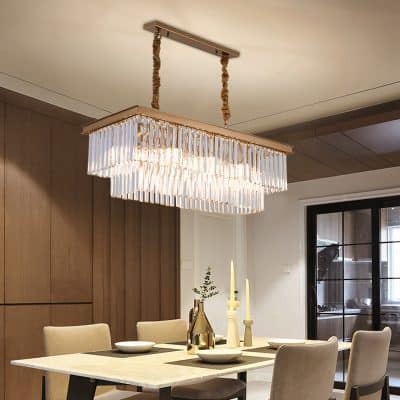 Elegant crystal chandelier in a modern dining room with neutral tones and minimalist decor, perfect for stylish interior lighting.