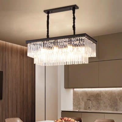 Elegant crystal chandelier lighting fixture in modern kitchen, enhancing ambiance and decor.
