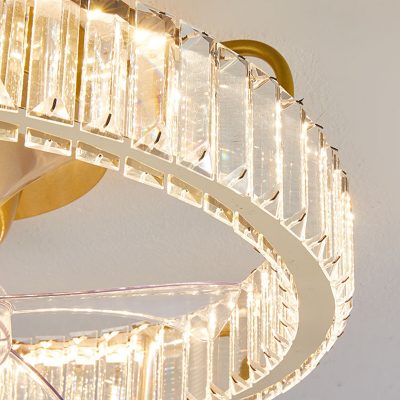 Elegant crystal chandelier with modern design, perfect for high-end eyewear stores like Monalisa Store, enhancing the shopping atmosphere with luxurious lighting options.