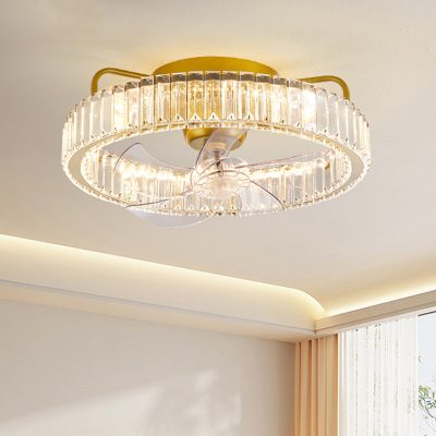 Chandelier with crystal accents illuminated in modern living room, elegant lighting fixture for stylish home decor.