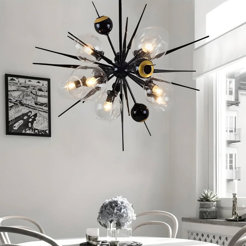 Contemporary black and gold sputnik chandelier with exposed bulbs, modern interior lighting fixture for stylish living rooms.