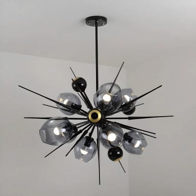 Modern black and glass chandelier with multiple bulbs, ideal for stylish living rooms and dining areas. Elegant lighting fixture adds contemporary flair to home decor.