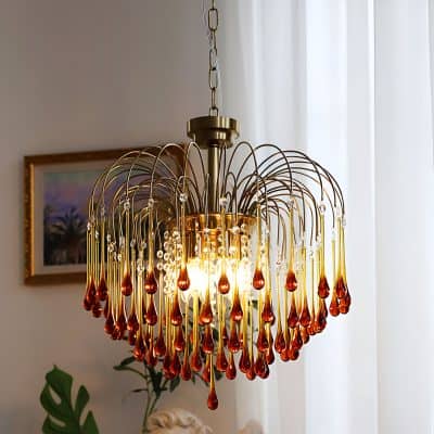 Elegant crystal chandelier hanging in a stylish interior, enhancing luxury home decor and lighting ambiance.