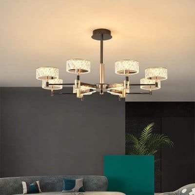 Elegant modern chandelier with six fabric-shaded lights, perfect for upscale living rooms or dining areas. Stylish lighting fixture enhances contemporary interior decor and ambiance.