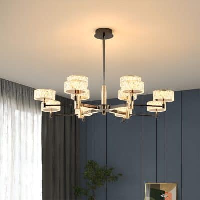 Chandelier lighting fixture with modern design, featuring multiple illuminated lamps, installed on a ceiling in a stylish interior space.
