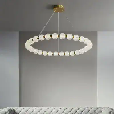 Elegant modern chandelier with glass globe accents, ideal for upscale living rooms and dining areas, enhancing contemporary interior decor.