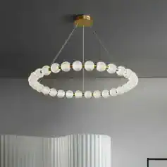 Elegant modern chandelier with crystal and gold accents, perfect for upscale interiors, offering sophisticated lighting solutions for living rooms, dining areas, or conference rooms.