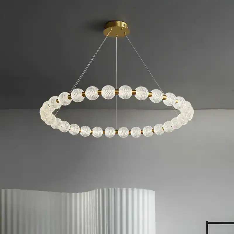 Elegant modern chandelier with crystal and gold accents, perfect for upscale interiors, offering sophisticated lighting solutions for living rooms, dining areas, or conference rooms.