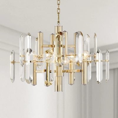Elegant gold and crystal chandelier for modern interior lighting and home decor. Perfect for upscale living rooms, dining areas, or offices, adding luxury and style.