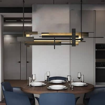 Modern dining area with elegant table setting and contemporary interior design. Perfect for a stylish home or luxury apartment, showcasing minimalist decor and sophisticated lighting.