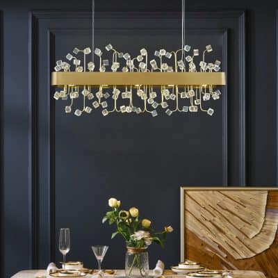 Face chandelier with crystal accents for modern luxury hotel decor.
