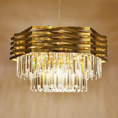 Elegant gold and crystal chandelier lighting fixture, perfect for luxury interiors, dining rooms, or living spaces to add sophistication and style.