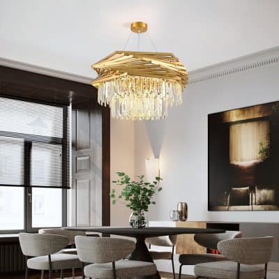Chandelier in a modern dining room with elegant decor and natural sunlight, stylish furniture, and contemporary art, highlighting luxury and sophistication in interior design.