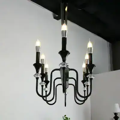 Chic black chandelier with crystal accents, ideal for modern optician store decor and optical retail lighting, enhancing store ambiance and customer experience.