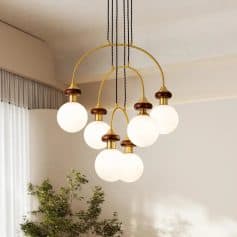 Modern gold and white chandelier lighting fixture with multiple globes for elegant home decor - Monalisa Store.